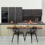 Black kitchen cabinets with black chairs