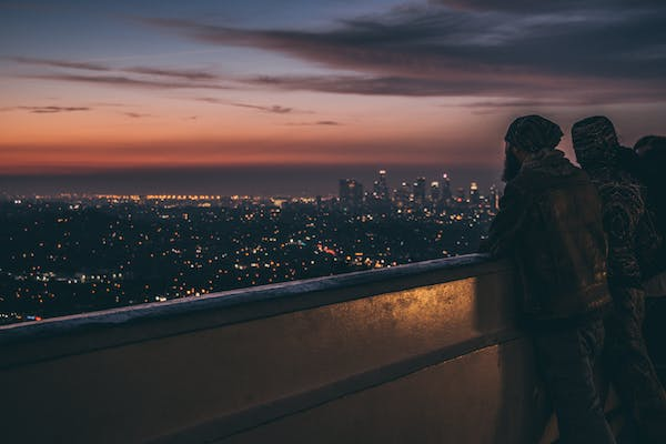 people enjoying views from the balcony